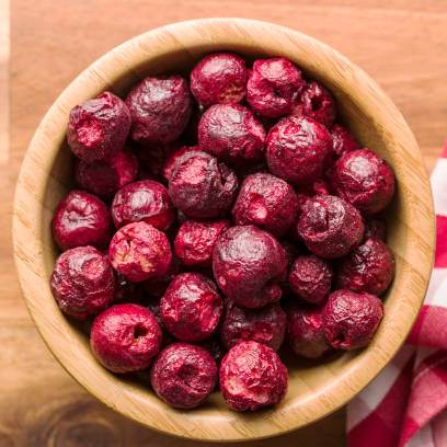 freeze dried sour cherries in a wooden bowl