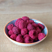 freeze dried whole raspberries in a bowl