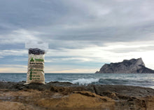 TentMeals Blueberry burst 800kcal breakfast, sitting on a rock with the sea in the background.