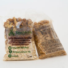 Two packs of TentMeals Subtly cinnamon 500kcal breakfast, showing the front and back labels.